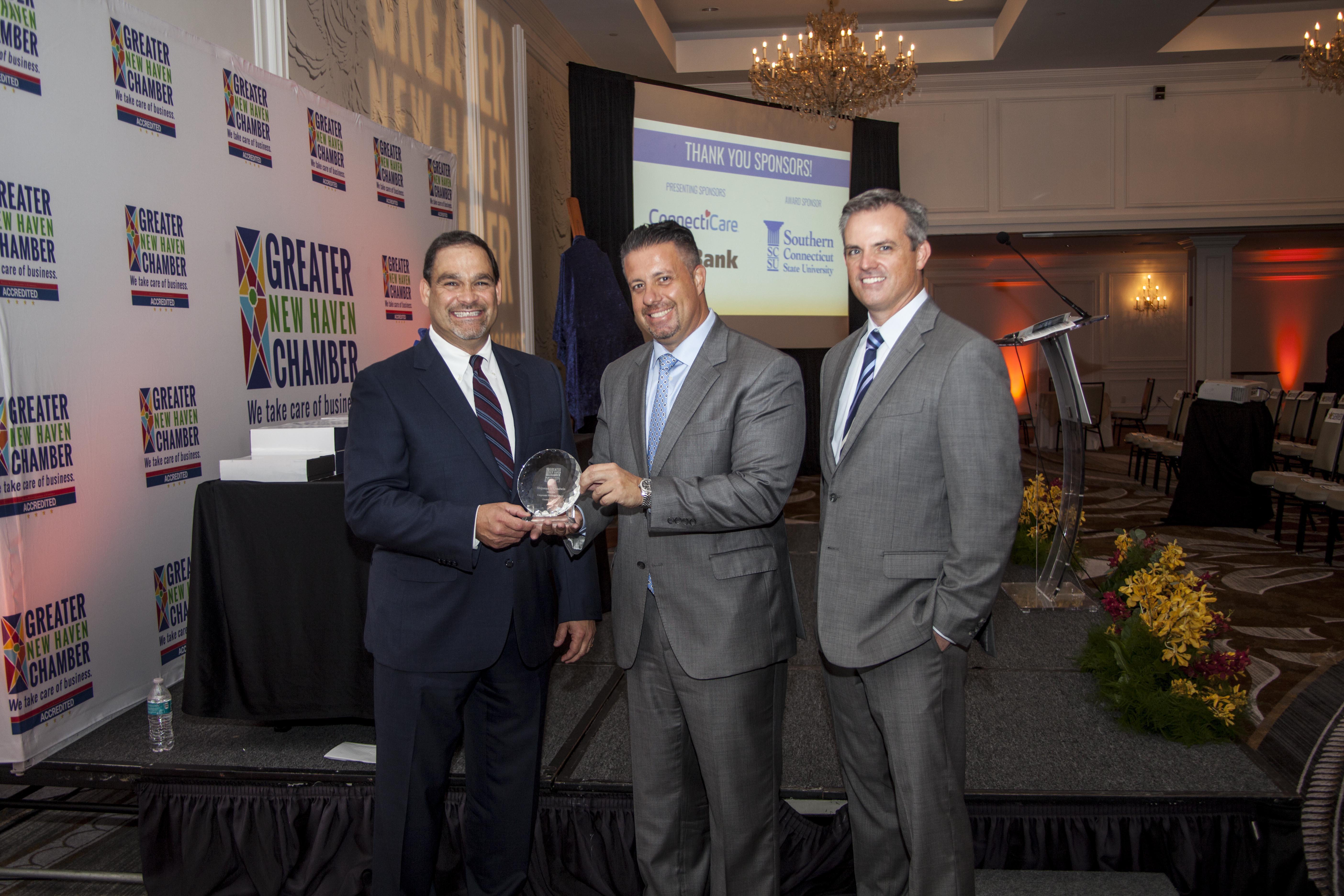 Joe Williams accepts Corporate Heritage Award from GNHCC photo