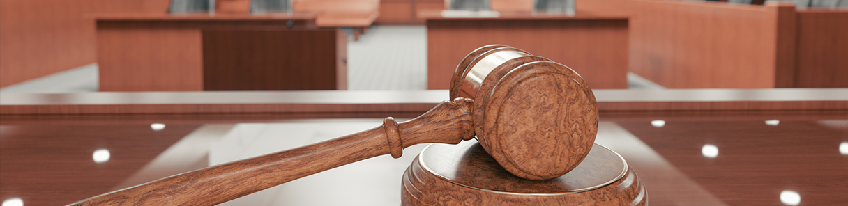 stock image of courtroom trial and gavel